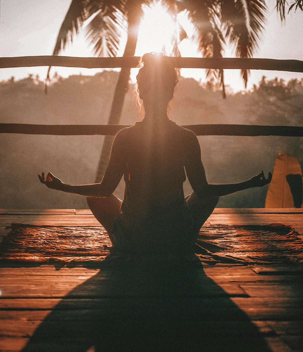 Lakeside yoga session at sunrise